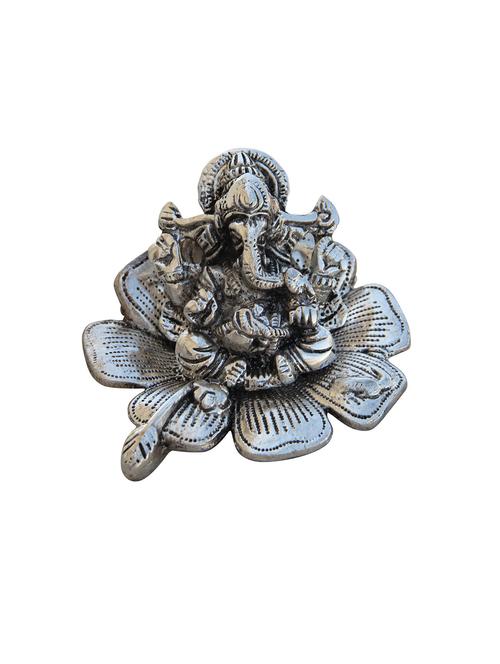 metal ganesha sitting on leaf - 11017608 - Very Small Image - 1