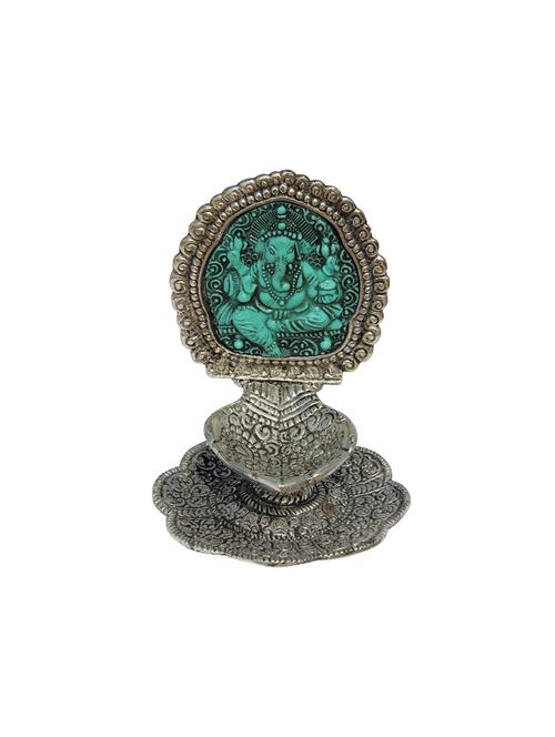 hand shaped diya on a base and ganesha motiff at the back - 11017639 - Very Small Image - 1