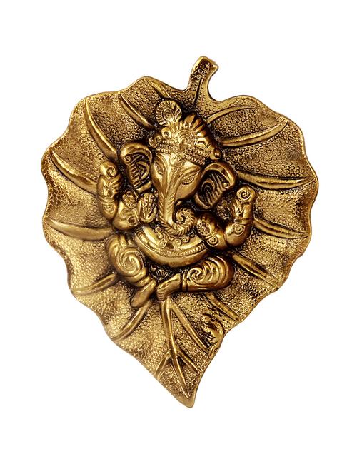 hanging golden ganesha placed on a antique finish leaf in metal by handicrafts paradise - 14120199 - Very Small Image - 1