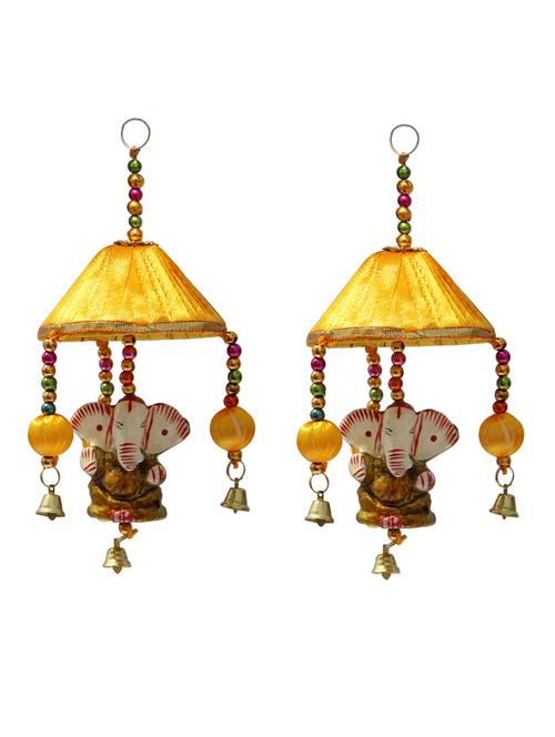 door hanging pair of golden ganesha under yellow cloth tokri with bells - 14120386 - Very Small Image - 1