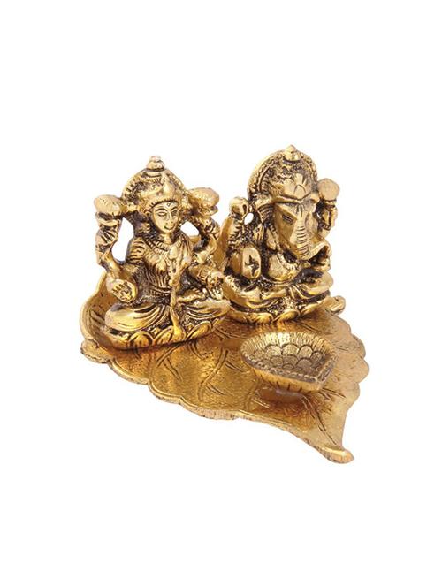 lakshmi ganesh diya on pipal leaf with diya antique gold plated by handicrafts paradise - 15558974 - Very Small Image - 1
