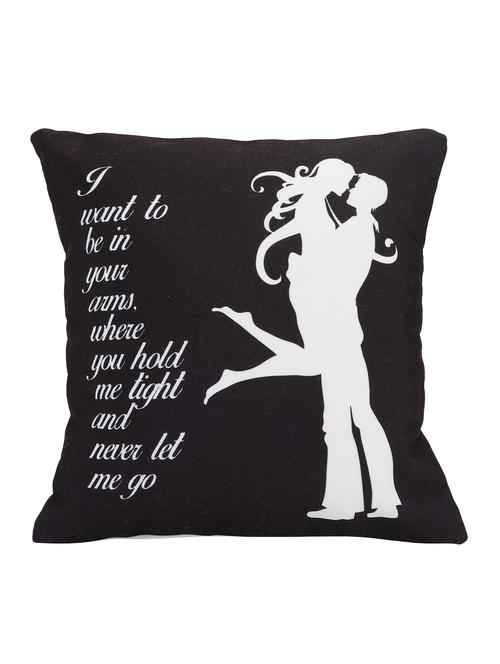 couple hugging black and white cushion. - 15941843 - Very Small Image - 1