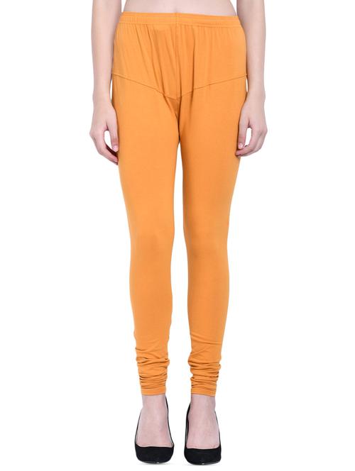 orange solid churidar - 16382591 - Very Small Image - 1