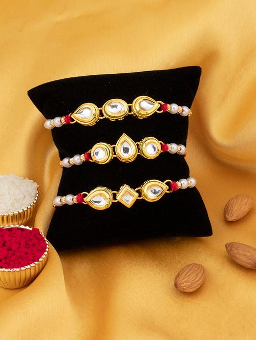 red and gold metal alloy rakhi set of 3 - 17743405 - Very Small Image - 1