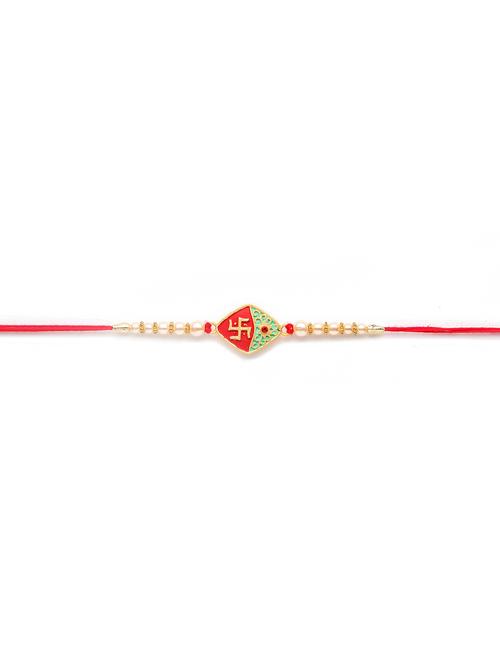 red & gold-coloured thread rakhi - 17843066 - Very Small Image - 1