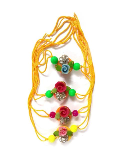 pack of 4 handcrafted thread rakhi - 17895686 - Very Small Image - 1
