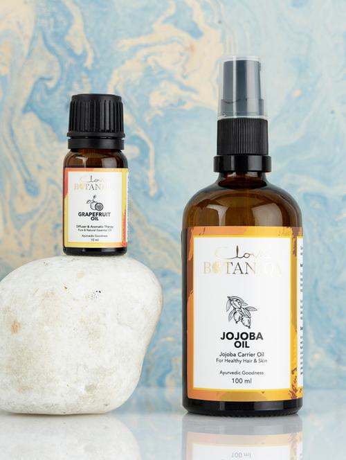 clovia botaniqa ayurvedic brightening oil combo - grapefruit essential oil -10ml & jojoba oil -100ml - 17920956 - Very Small Image - 1