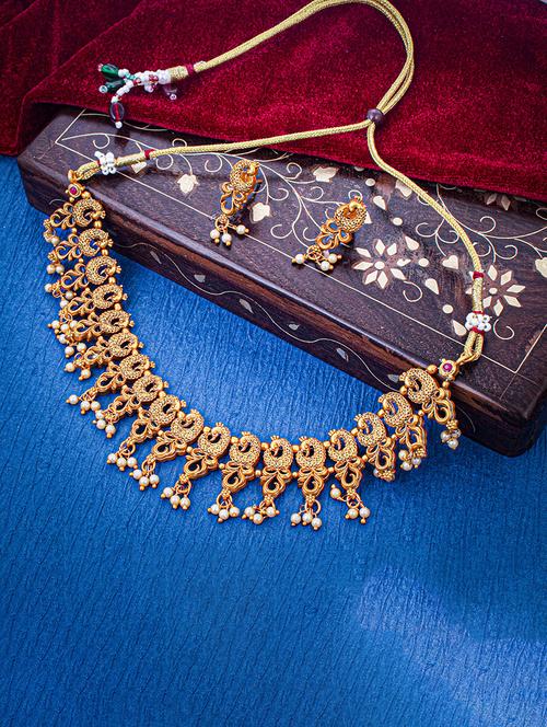gold metal necklaces and earring - 18296913 - Very Small Image - 1