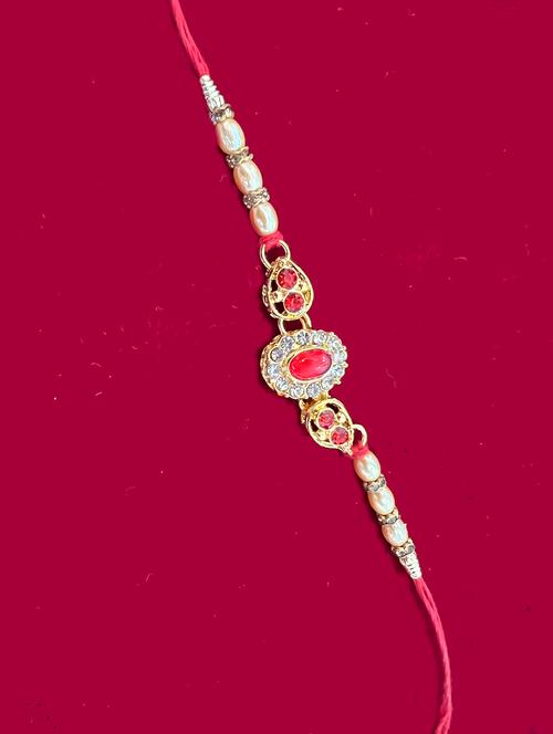 gold mauli thread rakhi set - 18436970 - Very Small Image - 1