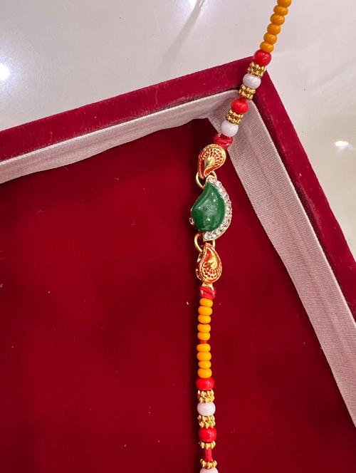 gold null rakhi set - 18436999 - Very Small Image - 1