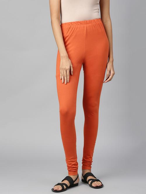 orange solid churidar - 18633859 - Very Small Image - 1