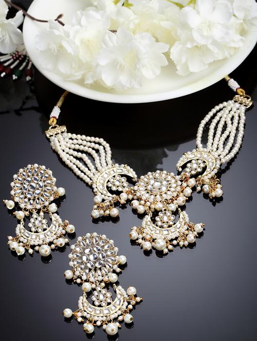 gold metal necklaces and earring - 18635983 - Very Small Image - 1