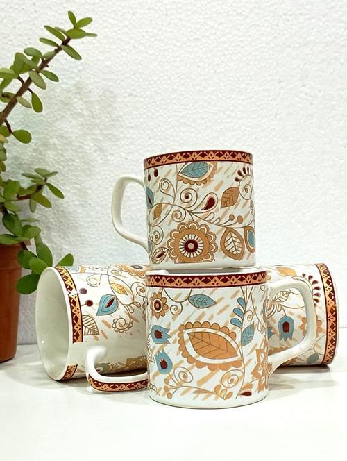 caffeine ceramic handmade white & gold floral tea cup set (set of 4) - 19408774 - Very Small Image - 1