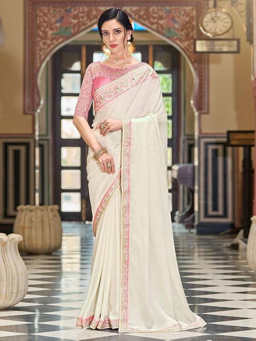 women off-white solid embroidered saree with blouse - 21723679 - Very Small Image - 1