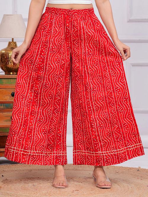 women bandhani print flared palazzo - 21729681 - Very Small Image - 1