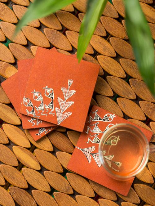 exclusivelane 'forest festivities' warli hand-painted wooden coasters in brick red (set of 4) - 14808476 - Very Small Image - 1