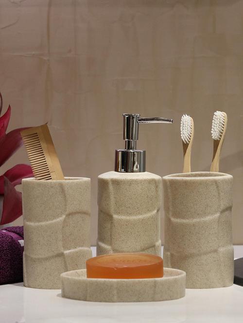 beige polyresin bath set collection of liquid soap dispenser, toothbrush holder, tumbler and soap dish - 15327390 - Very Small Image - 1