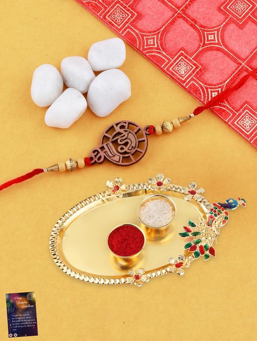 red brass plated thread rakhi with roli chawal kankawati thali and greeting card  - 17900802 - Very Small Image - 1