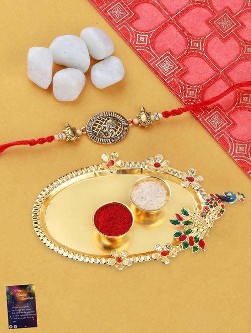 red gold plated thread rakhi with roli chawal kankawati thali and greeting card  - 17900818 - Very Small Image - 1