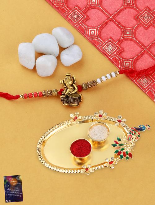 multi colored gold plated thread rakhi with roli chawal kankawati thali and greeting card  - 17900825 - Very Small Image - 1