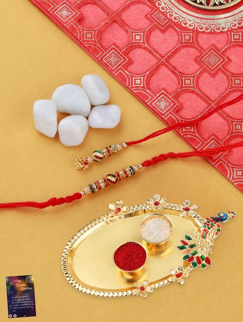 red handcrafted thread rakhi with roli chawal kankawati thali and greeting card  - 17900828 - Very Small Image - 1