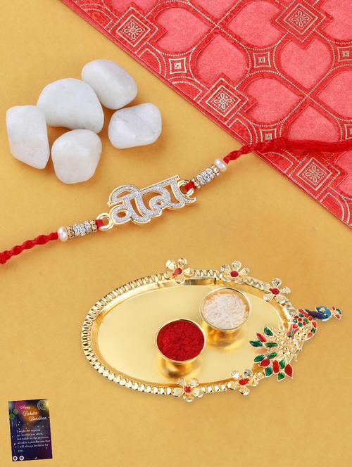 red gold plated thread rakhi with roli chawal kankawati thali and greeting card  - 17900830 - Very Small Image - 1