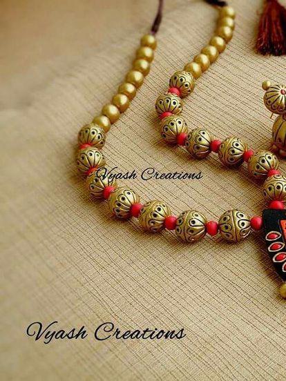 terracotta jewellery  - 18267078 - Very Small Image - 1