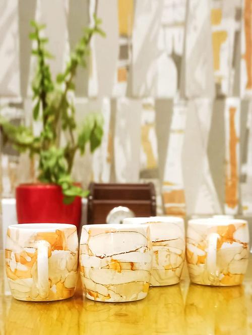 caffeine ceramic handmade yellow tea cup set (set of 4) - 19408789 - Very Small Image - 1