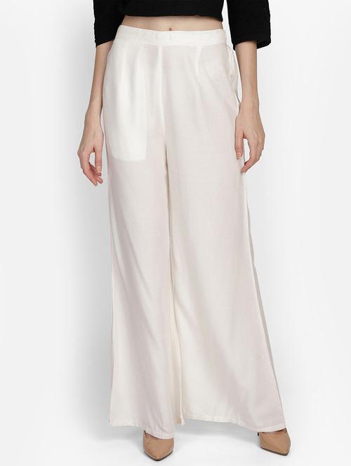 women cream solid flared palazzo - 20474476 - Very Small Image - 1