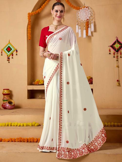 women solid with work embroidered saree with blouse - 22078206 - Very Small Image - 1