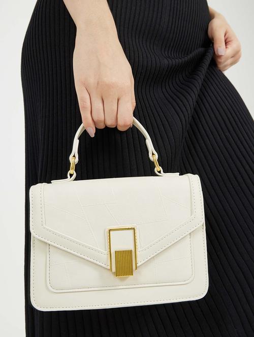 women cream solid handbag - 22176753 - Very Small Image - 1