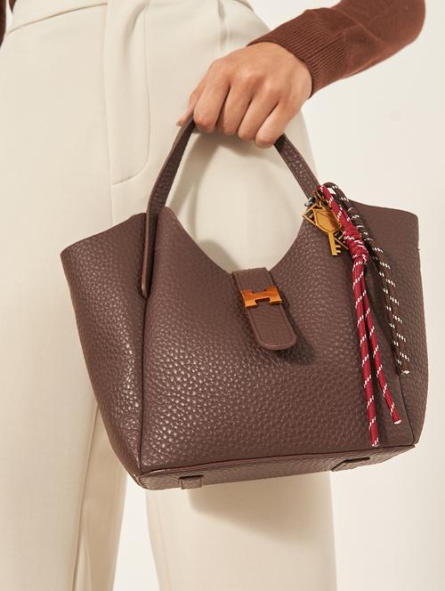 women brown solid handbag - 22176755 - Very Small Image - 1