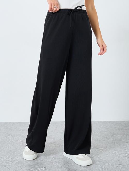 women solid high rise relaxed fit track pant - 22219919 - Very Small Image - 1