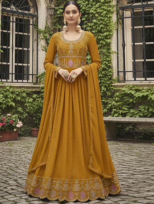 women solid with work semi-stitched suit set - 22379279 - Very Small Image - 1