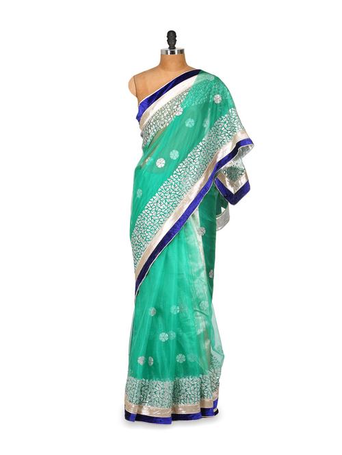 terrific teal tinted net saree - 79444 - Very Small Image - 1